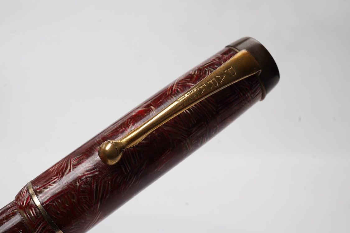 A Parker Senior UK Duofold 'red candy stripe' fountain pen with 14ct. gold 'N' nib